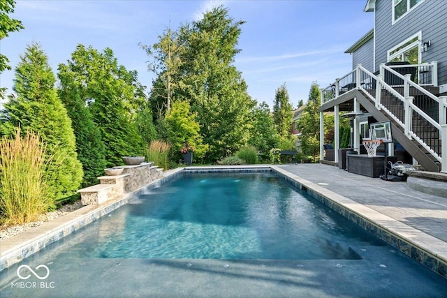 11322 Sea Side Ct, Fishers, IN 46040 - outdoor pool with stairs, a wooden deck, and a patio