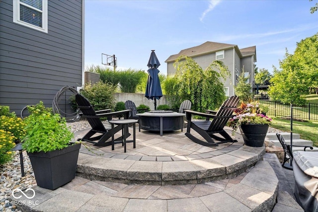 11322 Sea Side Ct, Fishers, IN 46040 - view of patio featuring a fire pit