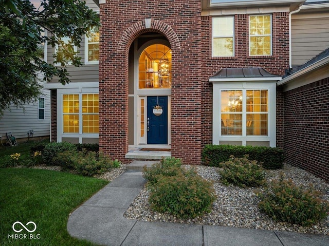 13059 Cirrus Dr, Fishers, IN 46037 - entrance to property featuring brick siding and a standing seam roof