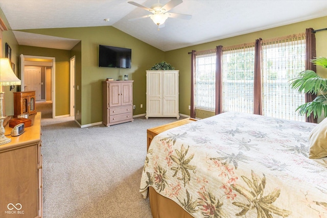 13059 Cirrus Dr, Fishers, IN 46037 - bedroom with vaulted ceiling, light carpet, and ceiling fan