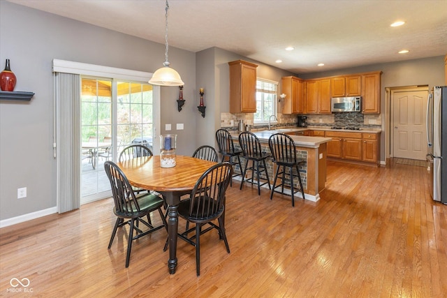 13059 Cirrus Dr, Fishers, IN 46037 - dining space with light wood-type flooring and recessed lighting