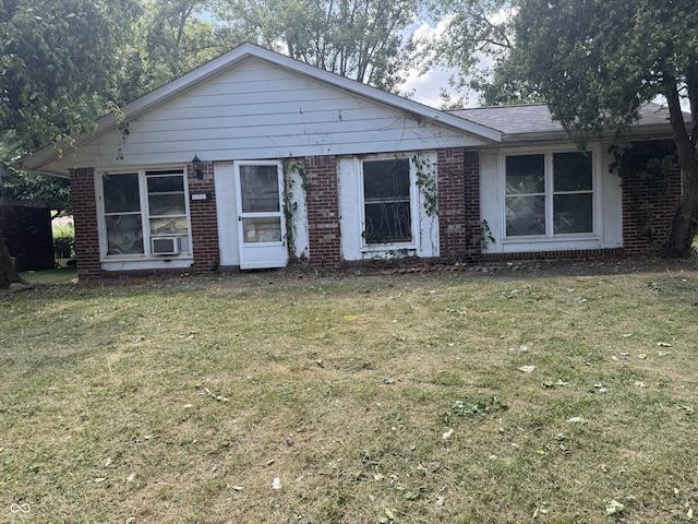 3514 Jerome Ct, Indianapolis, IN 46235 - view of front of home featuring brick siding and a front lawn
