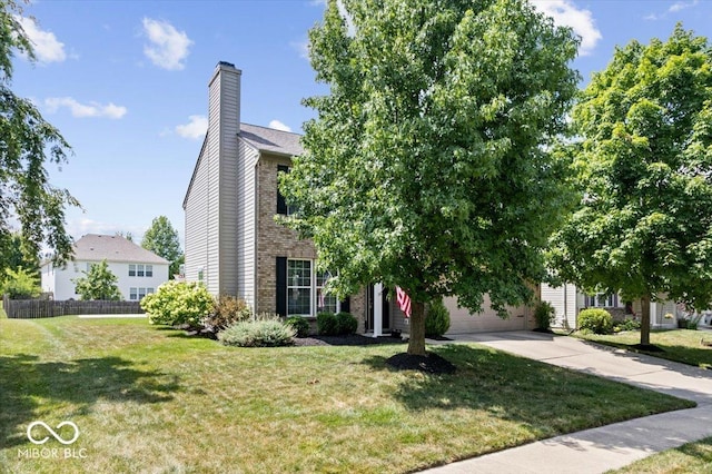 16009 Tenor Way, Noblesville, IN 46060 - view of front of property with driveway, brick siding, a chimney, and a garage