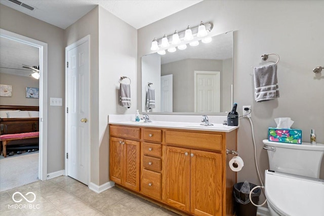 16009 Tenor Way, Noblesville, IN 46060 - full bathroom with double vanity, ensuite bathroom, tile patterned flooring, and ceiling fan