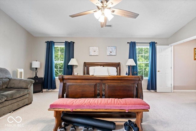 16009 Tenor Way, Noblesville, IN 46060 - bedroom with light colored carpet, multiple windows, and ceiling fan