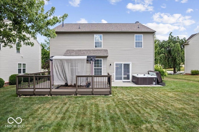 16009 Tenor Way, Noblesville, IN 46060 - rear view of house with a hot tub, a deck, and a lawn