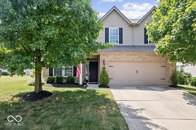 16009 Tenor Way, Noblesville, IN 46060 - traditional home featuring driveway, brick siding, a front yard, and an attached garage