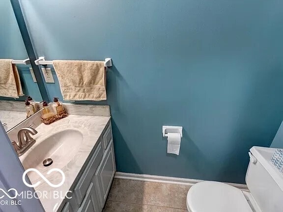 7327 Newbury Ct, Fishers, IN 46038 - bathroom featuring toilet and vanity