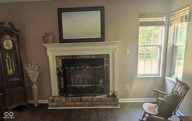 7327 Newbury Ct, Fishers, IN 46038 - detailed view of a brick fireplace and wood finished floors