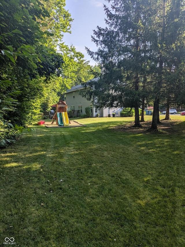 7327 Newbury Ct, Fishers, IN 46038 - view of grassy yard with a playground