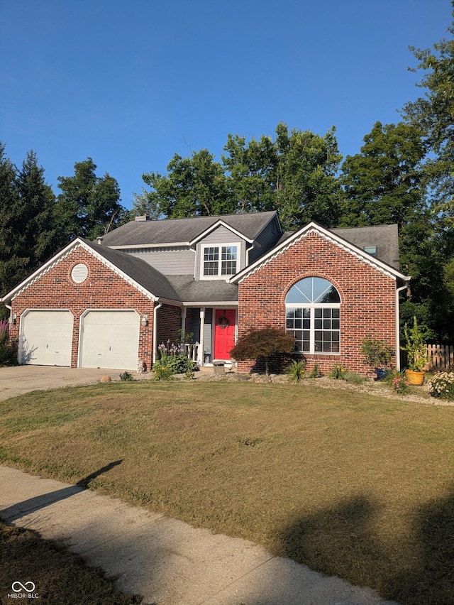 7327 Newbury Ct, Fishers, IN 46038 - traditional home with brick siding, an attached garage, a front lawn, and concrete driveway