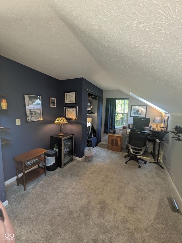 7327 Newbury Ct, Fishers, IN 46038 - carpeted office space featuring vaulted ceiling and a textured ceiling