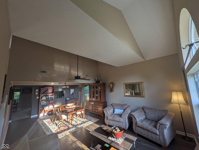 7327 Newbury Ct, Fishers, IN 46038 - living area with high vaulted ceiling, a ceiling fan, and wood finished floors