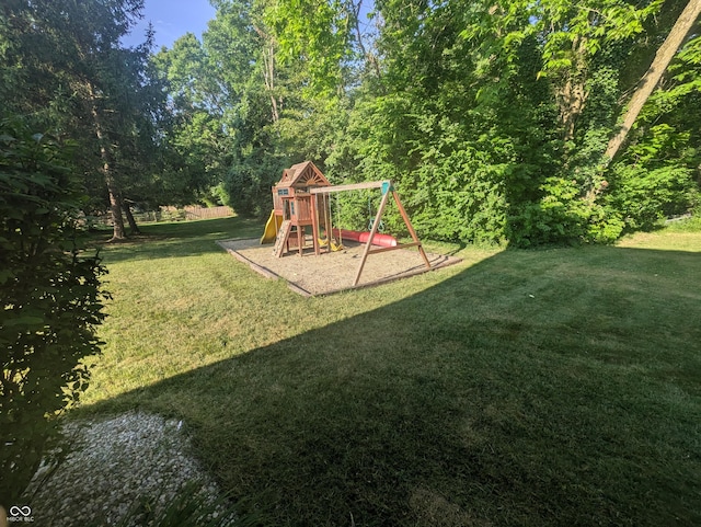 7327 Newbury Ct, Fishers, IN 46038 - view of green lawn featuring a playground