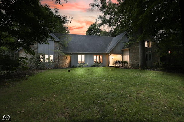 118 White Horse Ln, Fishers, IN 46038 - view of front facade featuring stone siding and a front lawn