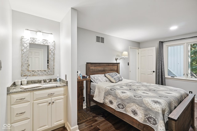 118 White Horse Ln, Fishers, IN 46038 - bedroom featuring dark wood-type flooring and a sink