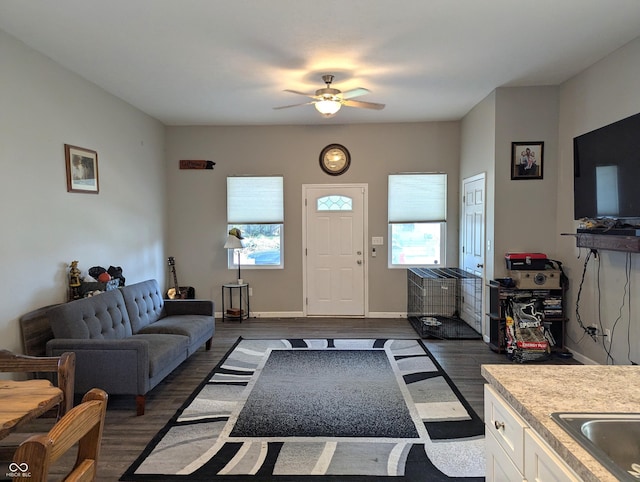 2032 Indiana Ave, Columbus, IN 47201 - living area with dark wood-style floors, plenty of natural light, and ceiling fan