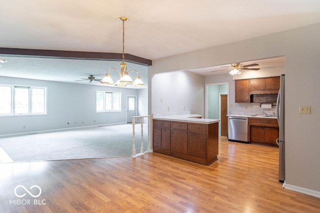 1189 N County Road 475 E, Avon, IN 46123 - kitchen featuring stainless steel appliances, a ceiling fan, a peninsula, light countertops, and beam ceiling