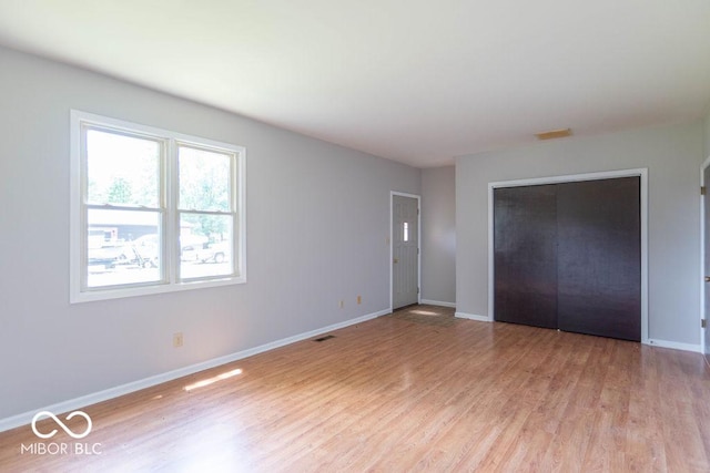 1189 N County Road 475 E, Avon, IN 46123 - unfurnished bedroom with light wood-type flooring and a closet