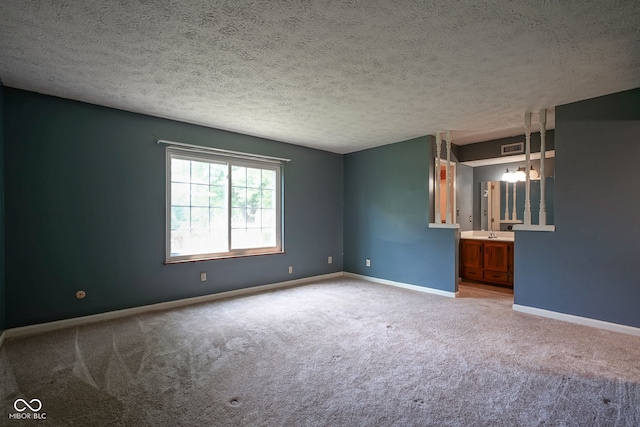 8809 Haddington Dr N, Indianapolis, IN 46256 - unfurnished bedroom with carpet floors, a textured ceiling, and connected bathroom