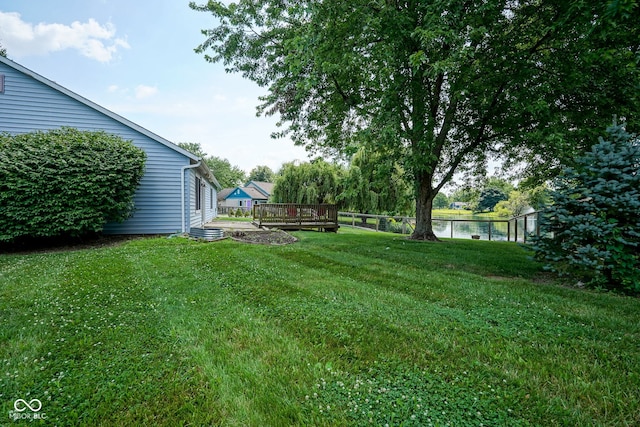 8809 Haddington Dr N, Indianapolis, IN 46256 - view of yard featuring a deck with water view