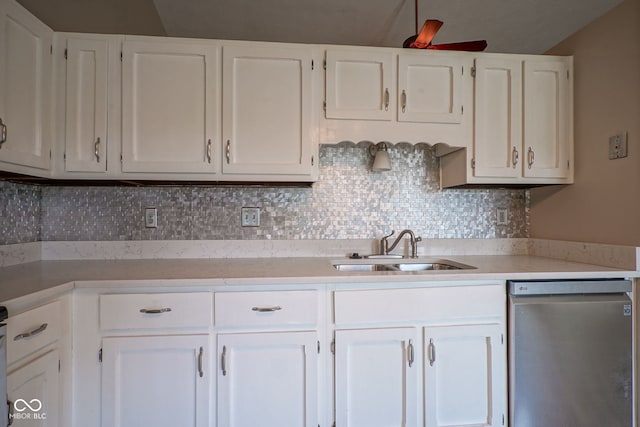 8809 Haddington Dr N, Indianapolis, IN 46256 - kitchen with stainless steel dishwasher, white cabinetry, and light countertops