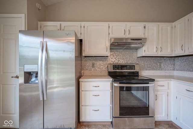8809 Haddington Dr N, Indianapolis, IN 46256 - kitchen featuring appliances with stainless steel finishes, under cabinet range hood, light countertops, tasteful backsplash, and lofted ceiling