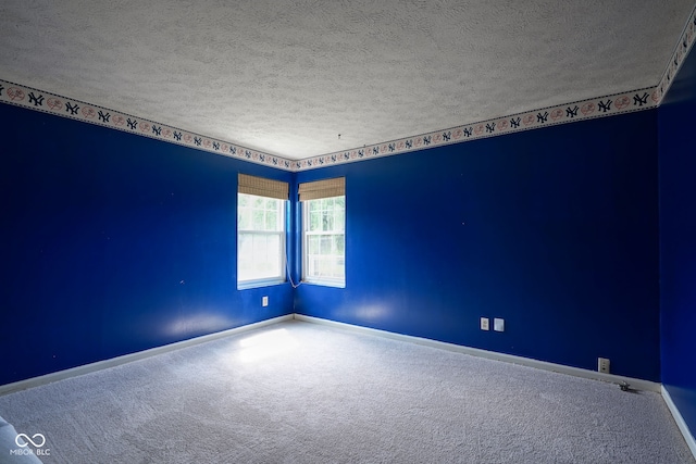 8809 Haddington Dr N, Indianapolis, IN 46256 - carpeted empty room featuring a textured ceiling and baseboards