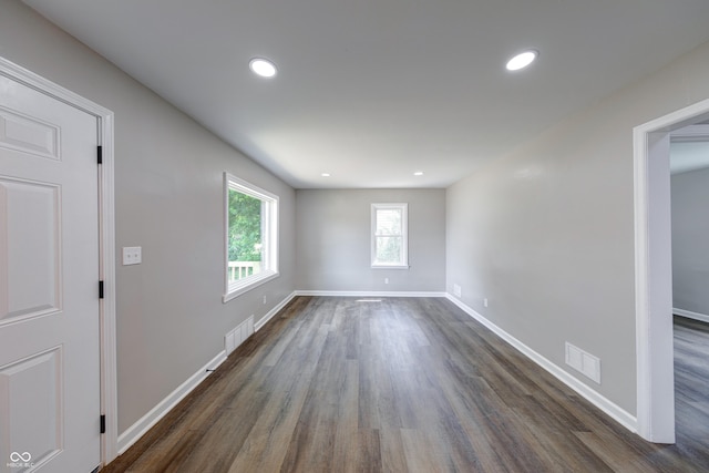 3748 N Olney St, Indianapolis, IN 46218 - unfurnished room featuring dark wood-style floors and recessed lighting