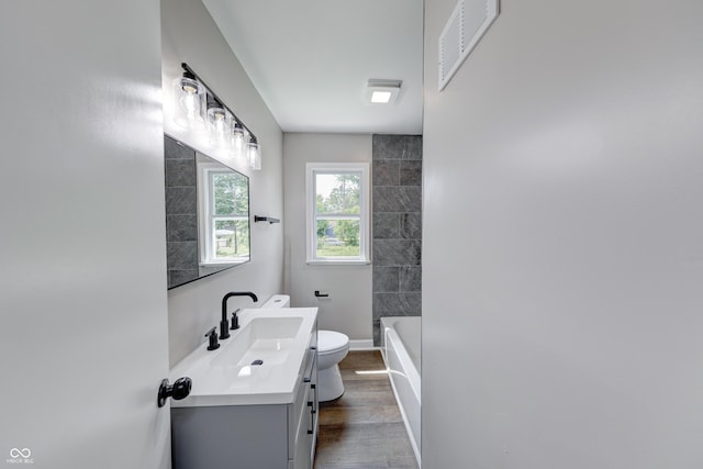 3748 N Olney St, Indianapolis, IN 46218 - full bath featuring vanity and wood finished floors