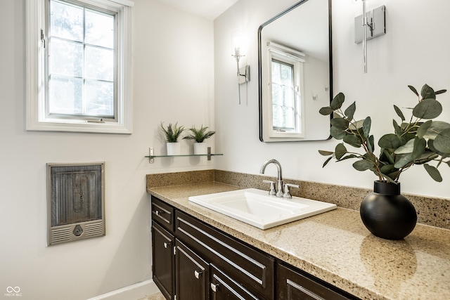 8627 Emerald Ln, Indianapolis, IN 46260 - bathroom with heating unit and vanity