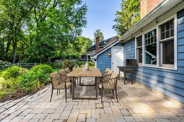 8627 Emerald Ln, Indianapolis, IN 46260 - view of patio / terrace with outdoor dining space
