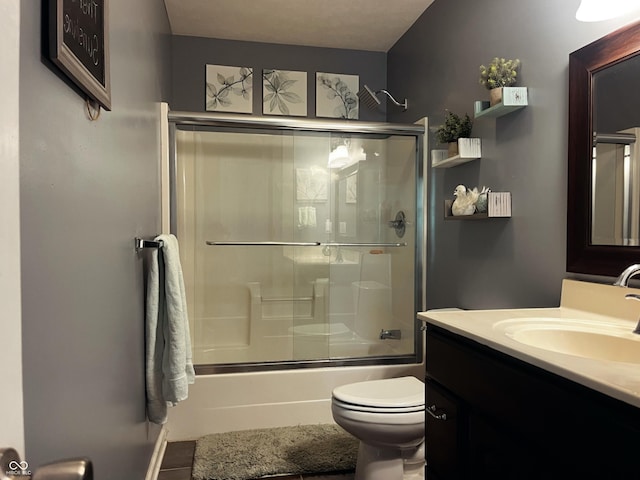 1646 N Nieman Dr, Greensburg, IN 47240 - full bath featuring vanity, shower / bath combination with glass door, and tile patterned floors