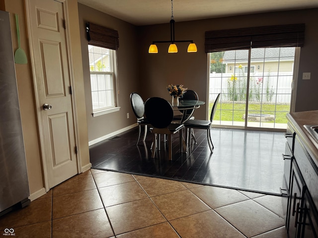 1646 N Nieman Dr, Greensburg, IN 47240 - dining area with tile patterned flooring and baseboards