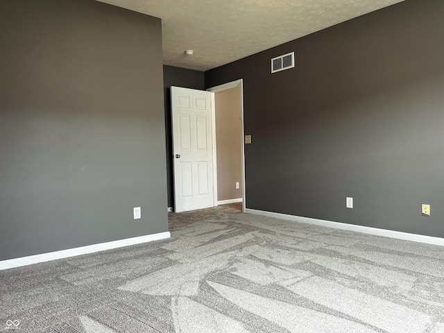 1646 N Nieman Dr, Greensburg, IN 47240 - spare room with carpet and a textured ceiling
