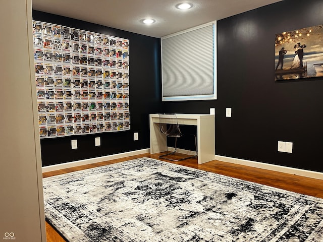 1646 N Nieman Dr, Greensburg, IN 47240 - empty room with wood finished floors and recessed lighting