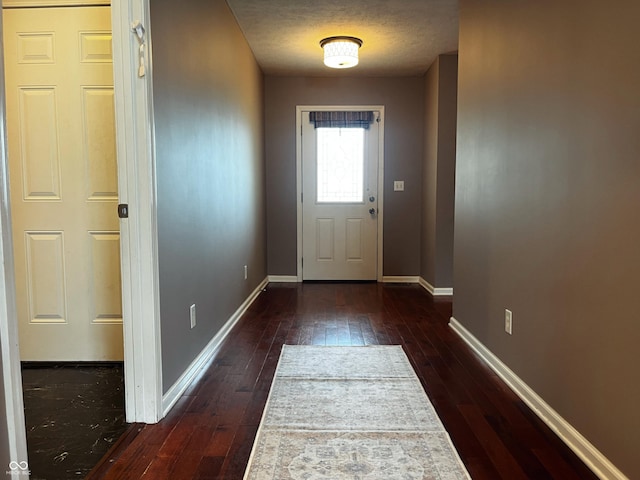 1646 N Nieman Dr, Greensburg, IN 47240 - doorway featuring hardwood / wood-style flooring and baseboards