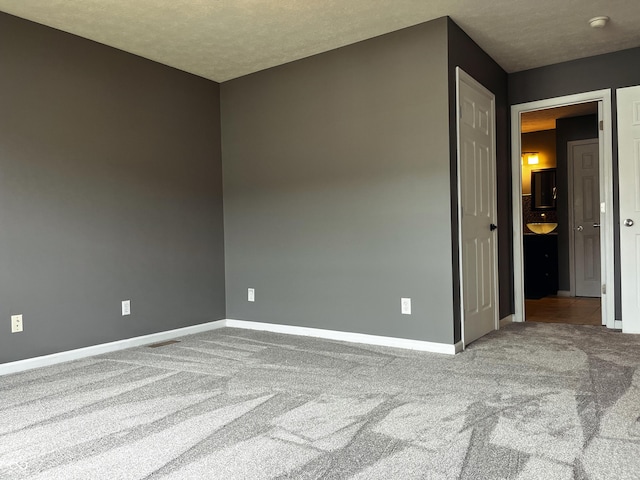 1646 N Nieman Dr, Greensburg, IN 47240 - carpeted empty room featuring baseboards and a smoke detector