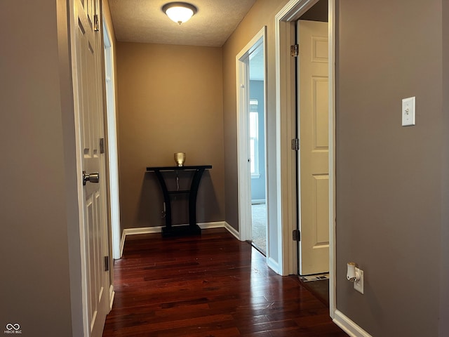 1646 N Nieman Dr, Greensburg, IN 47240 - corridor featuring dark wood-style flooring and a textured ceiling