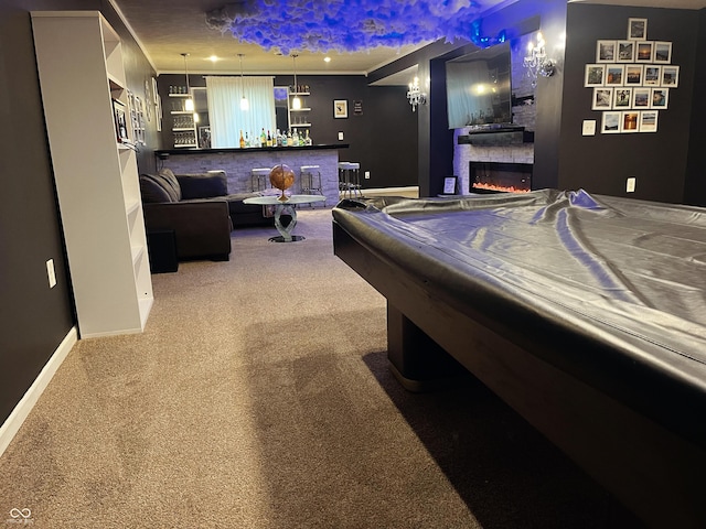 1646 N Nieman Dr, Greensburg, IN 47240 - recreation room with carpet floors and a glass covered fireplace