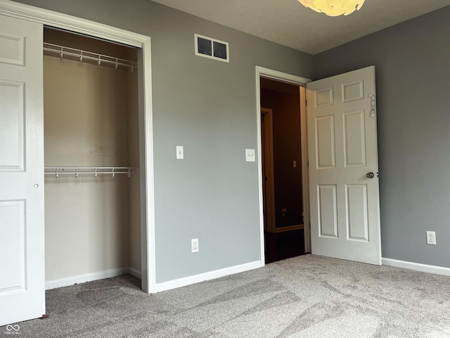 1646 N Nieman Dr, Greensburg, IN 47240 - unfurnished bedroom featuring a closet and carpet flooring