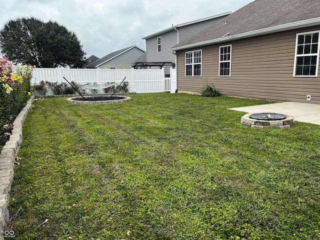 1646 N Nieman Dr, Greensburg, IN 47240 - view of yard featuring a fire pit and a patio area