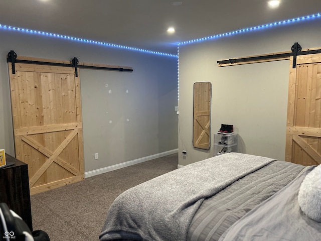 12059 Chapelwood Dr, Fishers, IN 46037 - carpeted bedroom featuring a barn door and recessed lighting