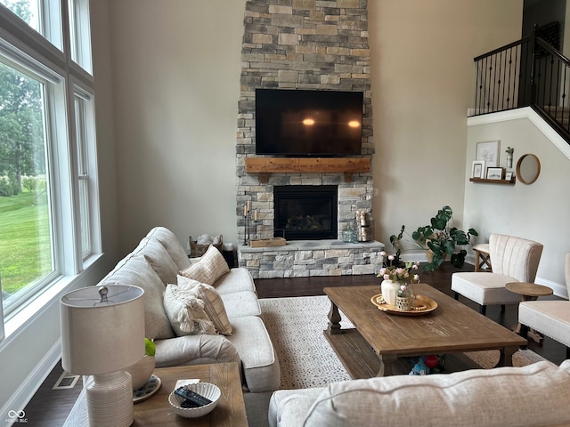 12059 Chapelwood Dr, Fishers, IN 46037 - living area featuring a fireplace and wood finished floors