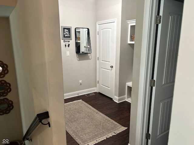 12059 Chapelwood Dr, Fishers, IN 46037 - corridor with dark wood-style flooring and baseboards