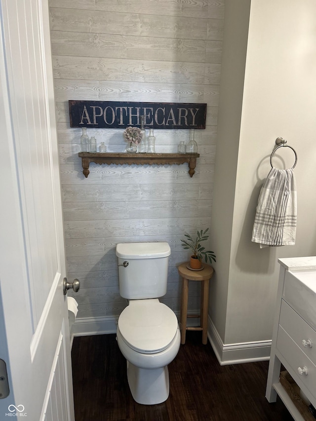 12059 Chapelwood Dr, Fishers, IN 46037 - bathroom with wood finished floors, vanity, and wooden walls