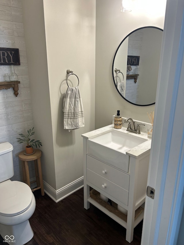 12059 Chapelwood Dr, Fishers, IN 46037 - half bath with vanity and wood finished floors
