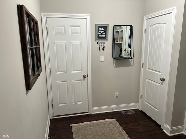 12059 Chapelwood Dr, Fishers, IN 46037 - hall with baseboards and dark wood-style floors
