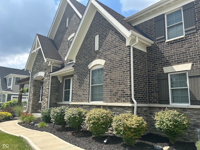 12059 Chapelwood Dr, Fishers, IN 46037 - view of property exterior featuring brick siding