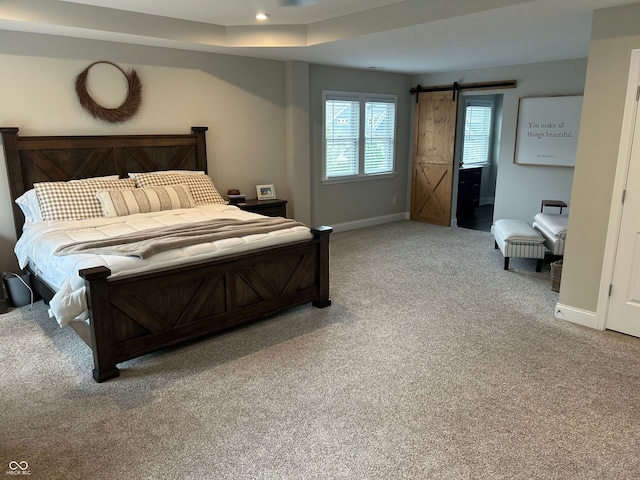 12059 Chapelwood Dr, Fishers, IN 46037 - bedroom with a barn door, light colored carpet, and recessed lighting